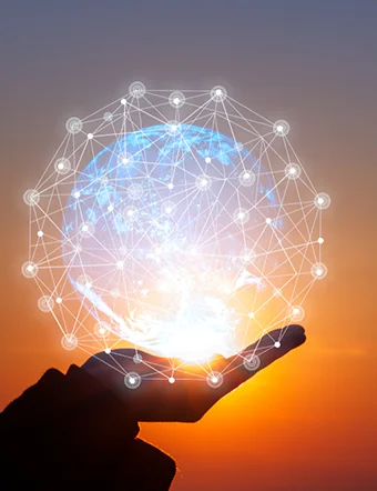 a digital and connected globe on the palm of a hand